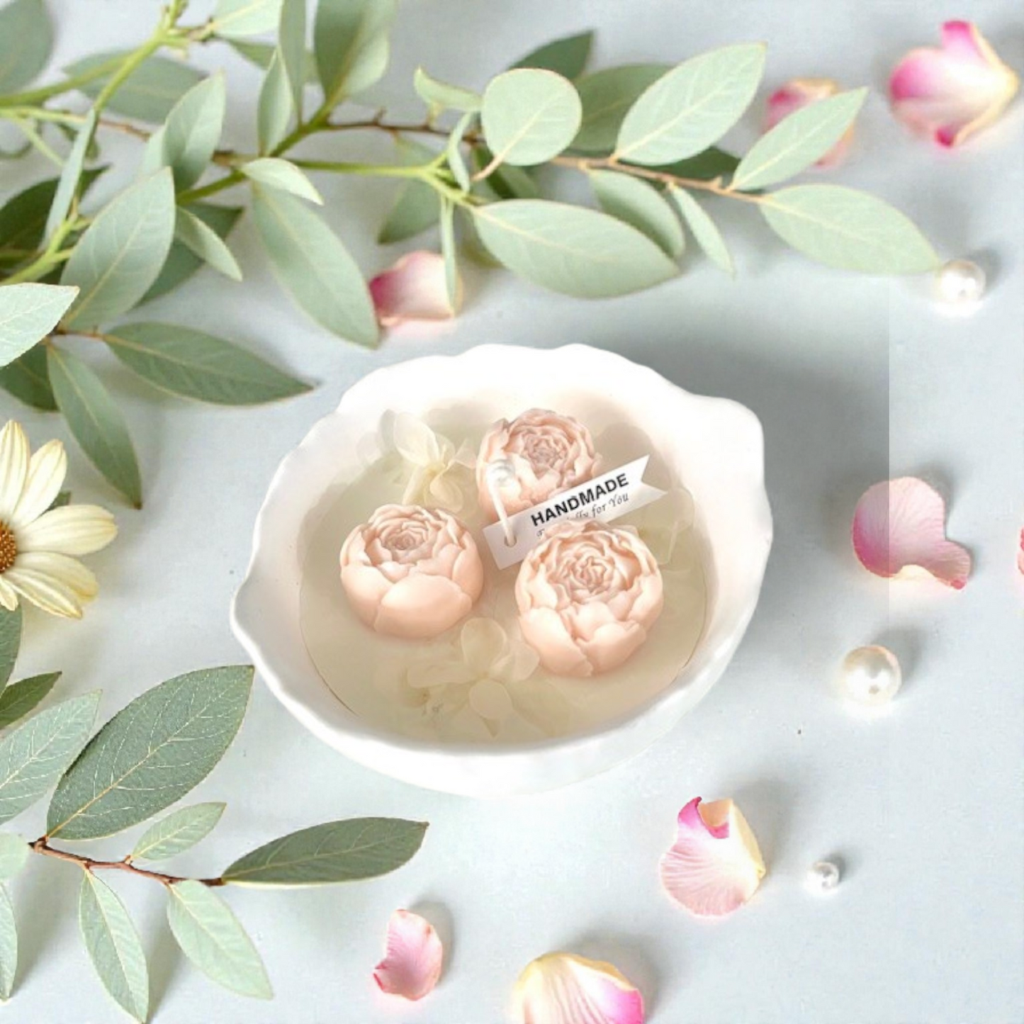 Decorative scented candle with peonies
