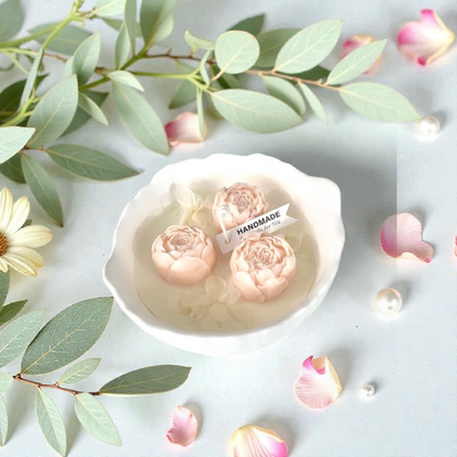 Decorative scented candle with peonies
