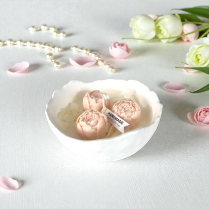 Decorative scented candle with peonies