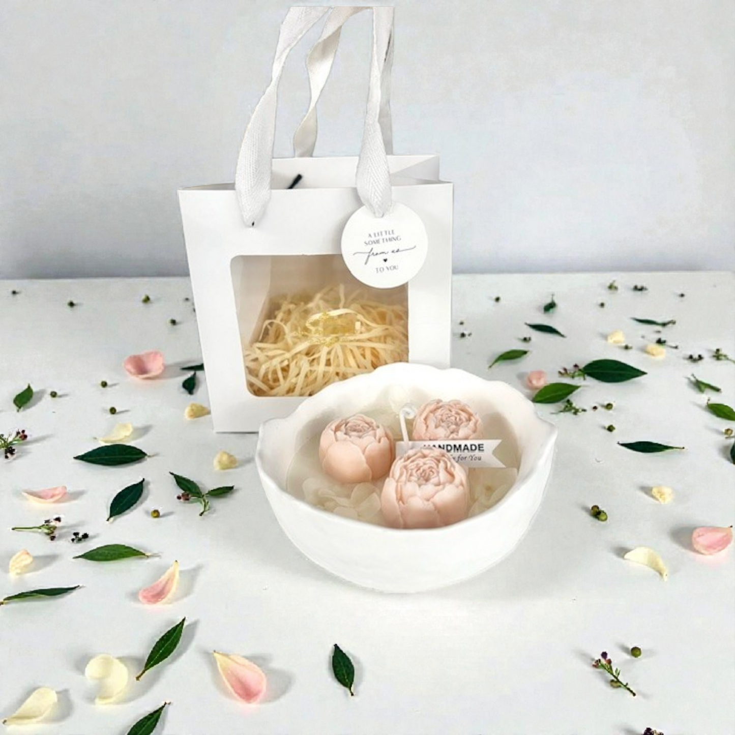 Decorative scented candle with peonies