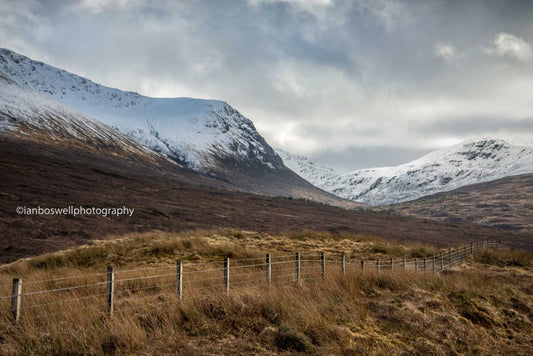 Snow on the hills near Loch Sgamhain, Highlands
